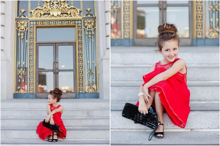 beautiful child model posing on steps of san francisco city hall
