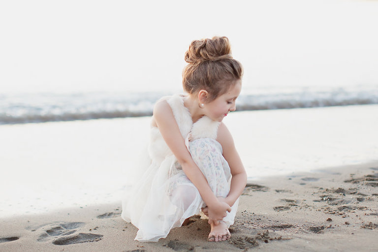 gorgeous child posing on sandy crab cove beach in alameda