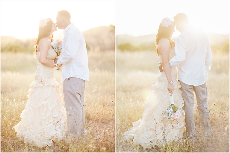 bride in cream colored vintage wedding gown in sun drenched portrait