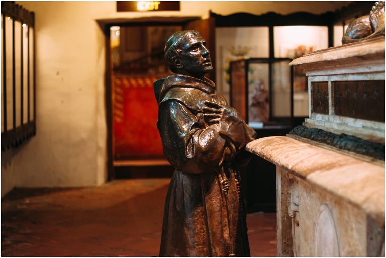 carmel mission saint praying statue in museum
