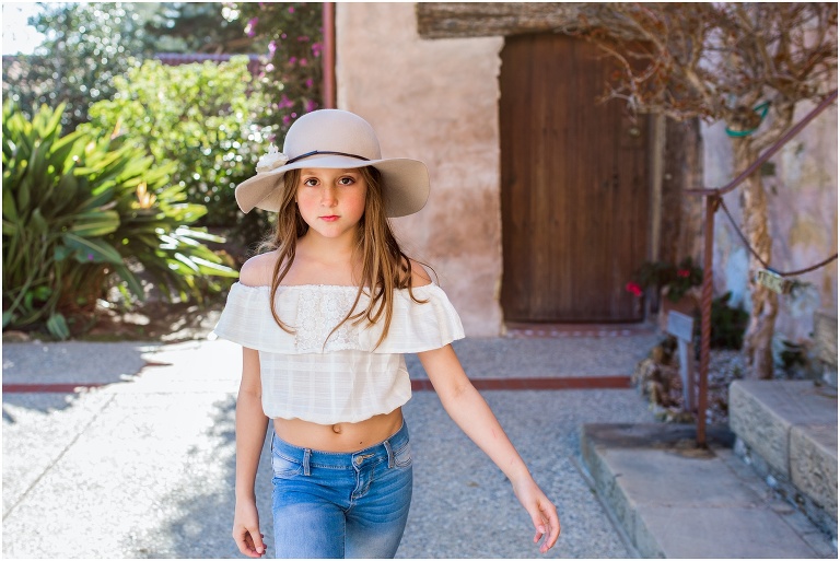 yound girl walking towards the camera at mission carmel