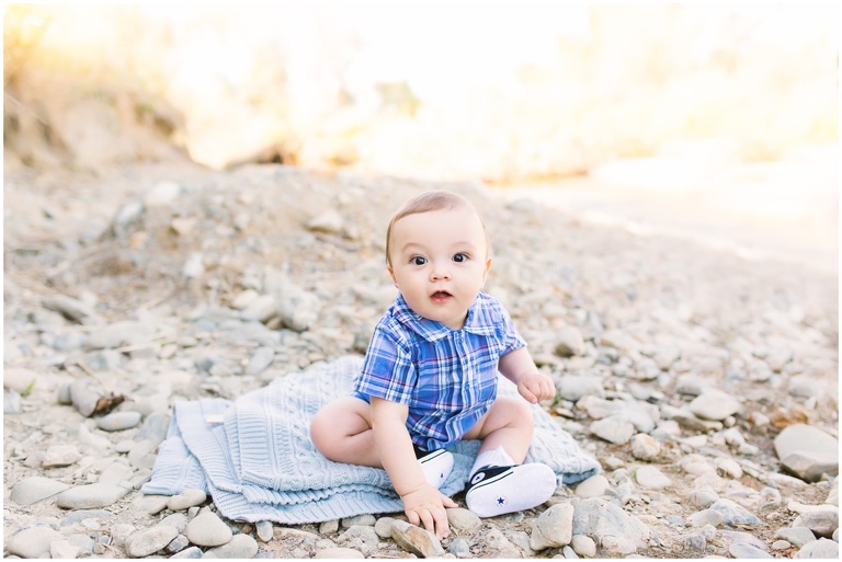 beautiful baby boy sitting on blue blanket brentwood family photographer